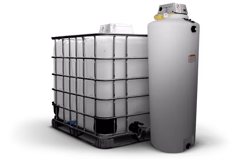 Large rectangular white tank with metal frame beside a tall cylindrical water heater or storage tank.