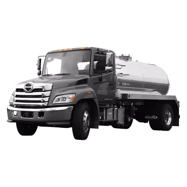Gray truck with a shiny silver tank, designed for liquid transport, featuring a flatbed.
