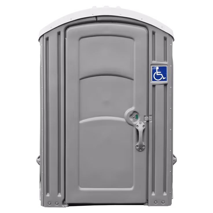 Portable toilet with a gray exterior and a blue handicap accessibility sign.
