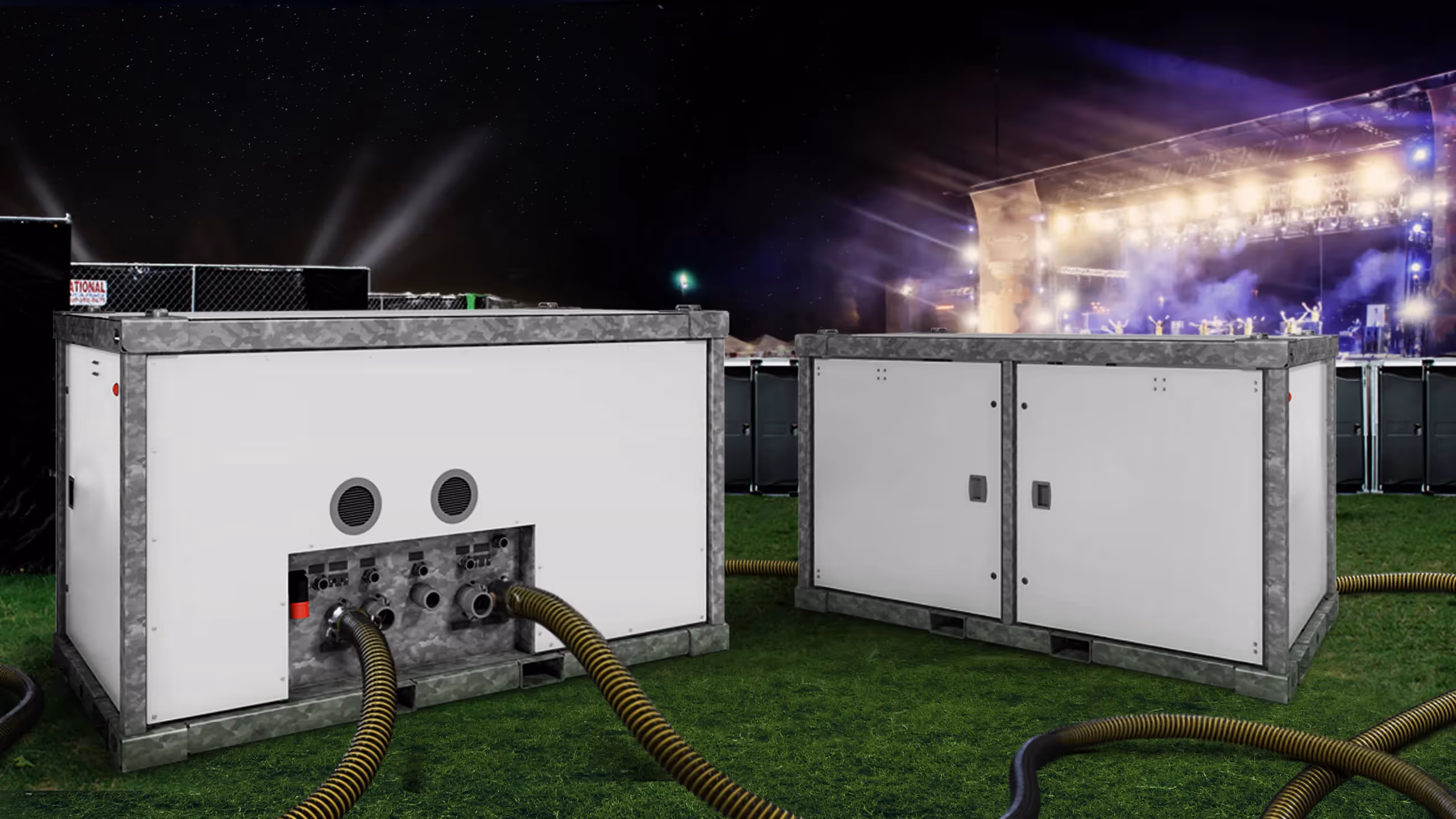 Sanitrax Tech Modules on grass, connected to hoses, with a concert stage in the background.