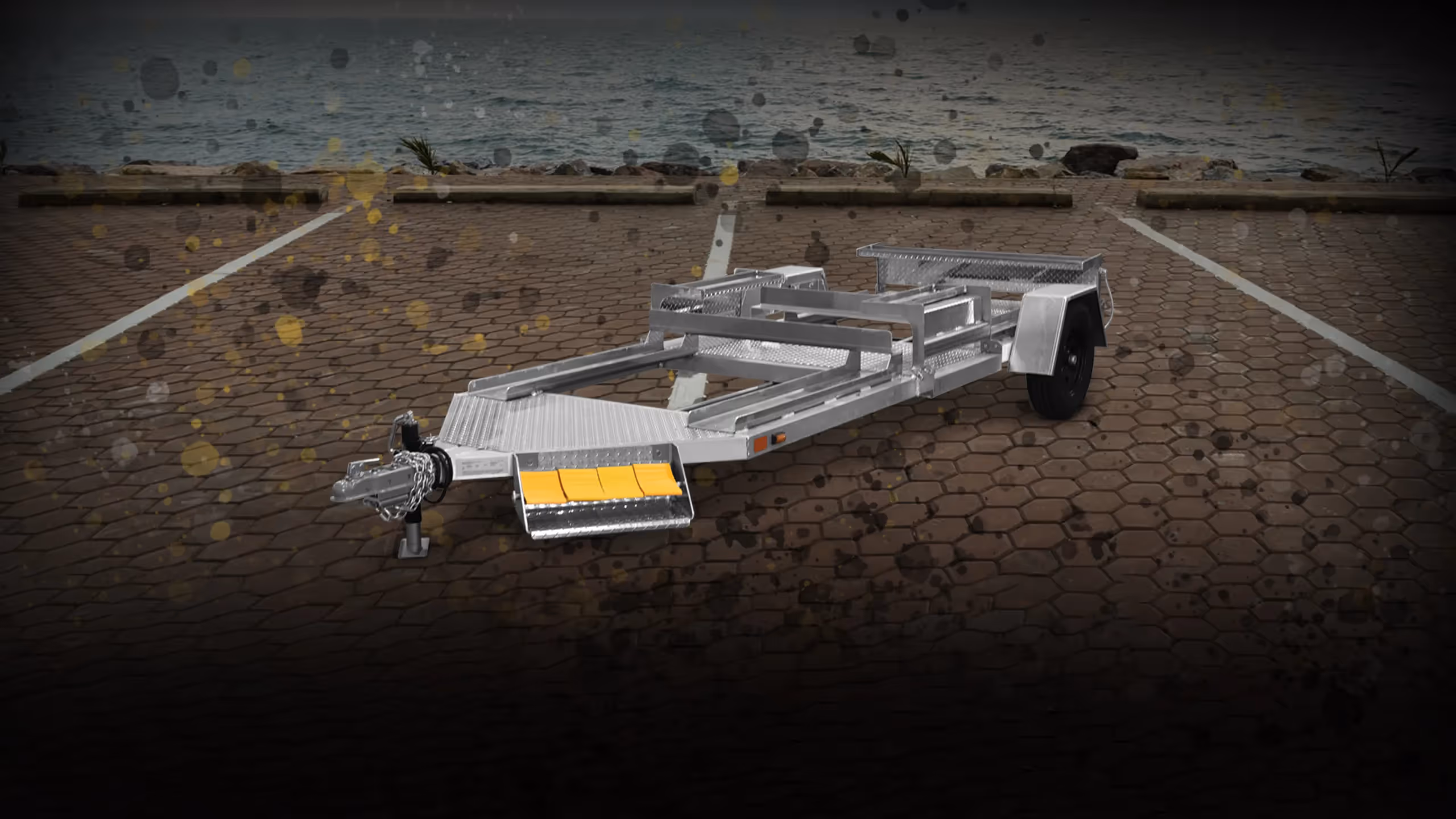Aluminum trailer with open frame design, featuring a single axle and a rear loading ramp.