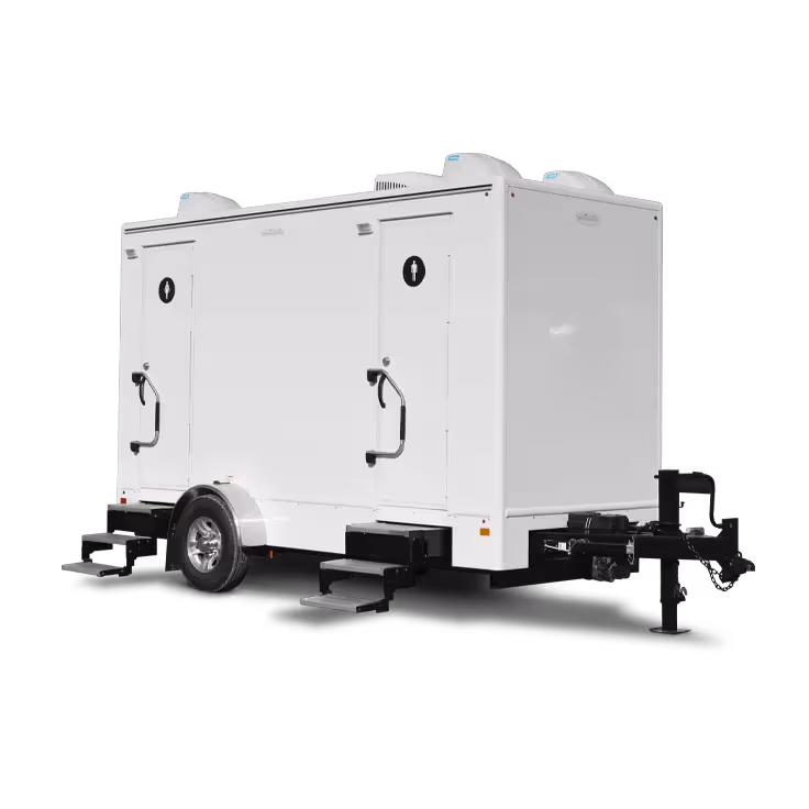 White portable restroom trailer with two doors and four stations, featuring steps and a hitch.