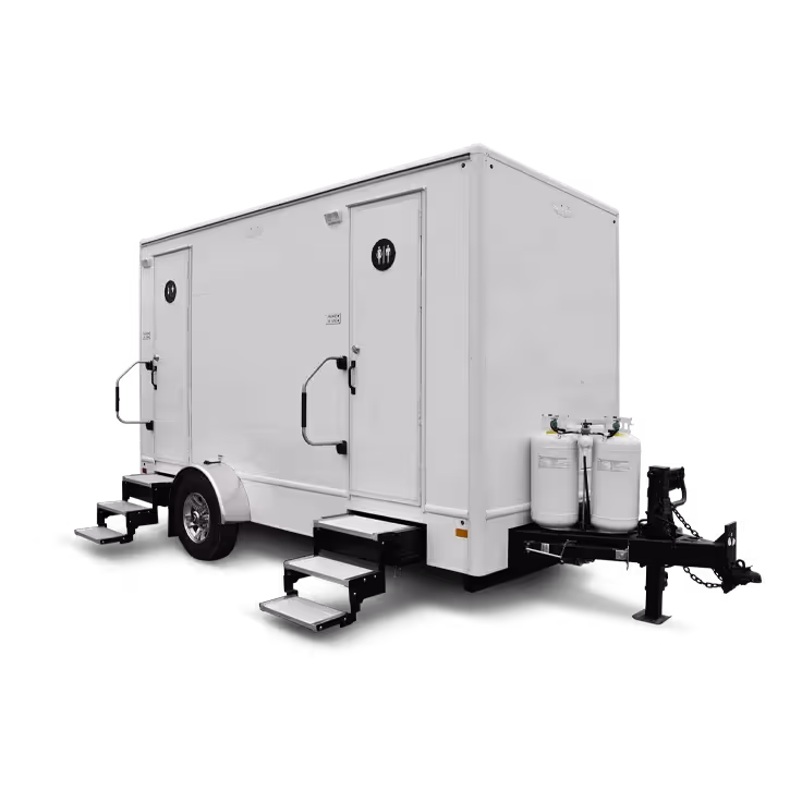 A white 6x14' 2-door combo shower trailer with steps and propane tanks on the side.