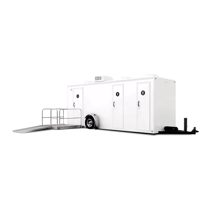 Portable restroom trailer with three doors, ramp access, and a compact design.