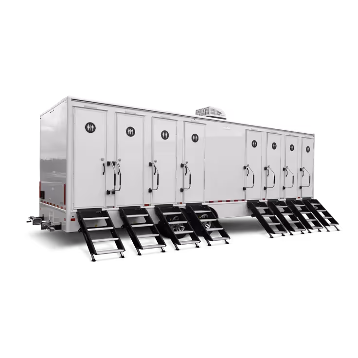 A mobile restroom trailer with eight doors and steps, featuring eight separate restroom stations.