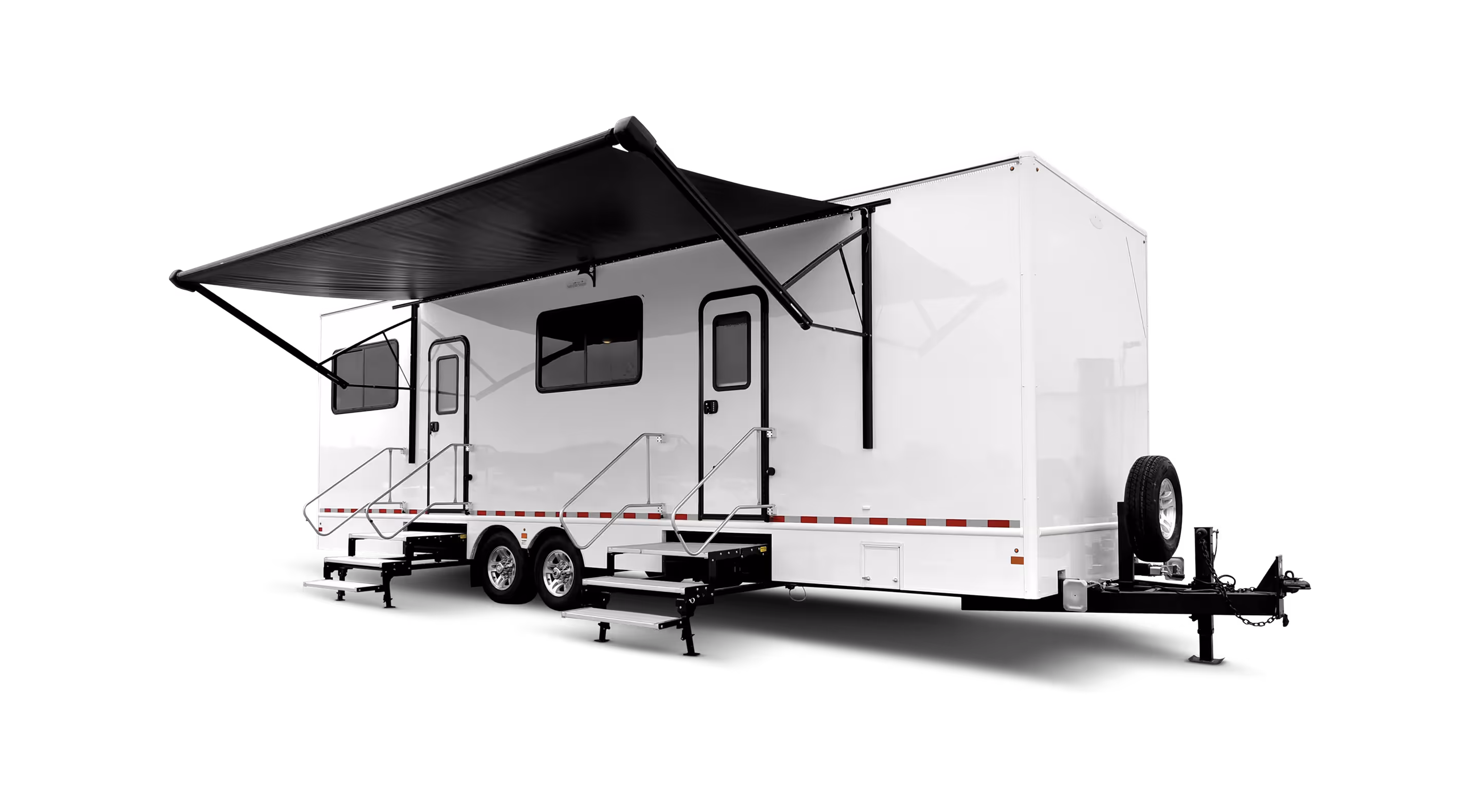 A white 8x30' command center trailer with an awning and dual stair access.