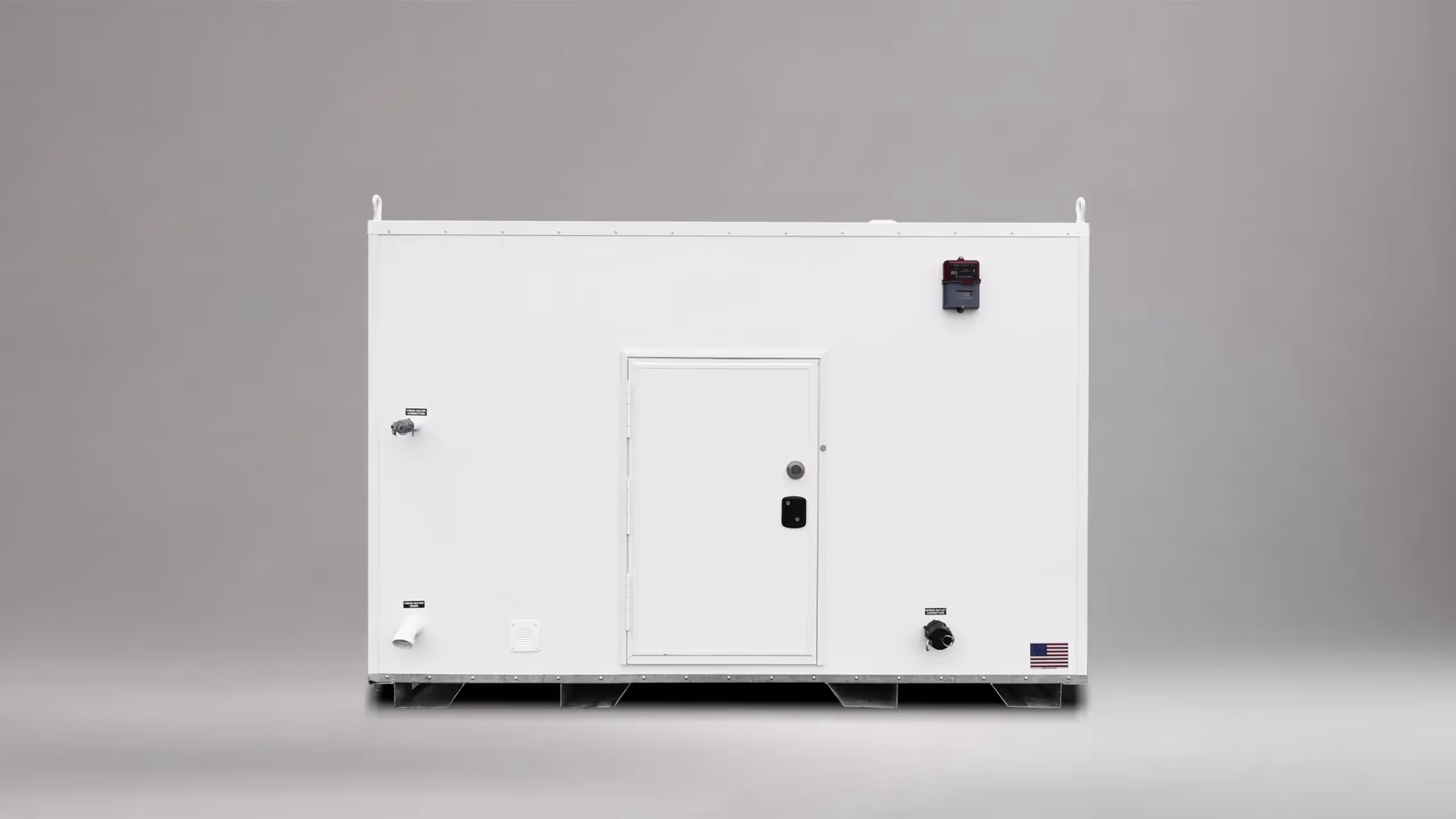 White brick pump house with a door, plumbing fixtures, and a ventilation unit.