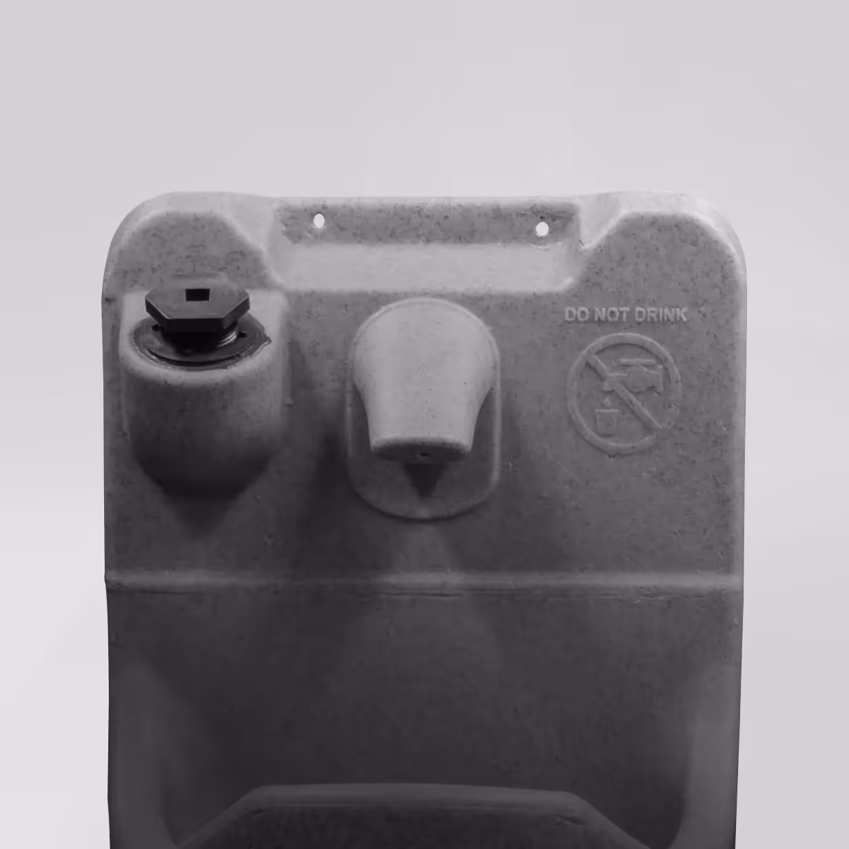 Gray water fountain with a spout and a 'Do Not Drink' warning on the upper right side.