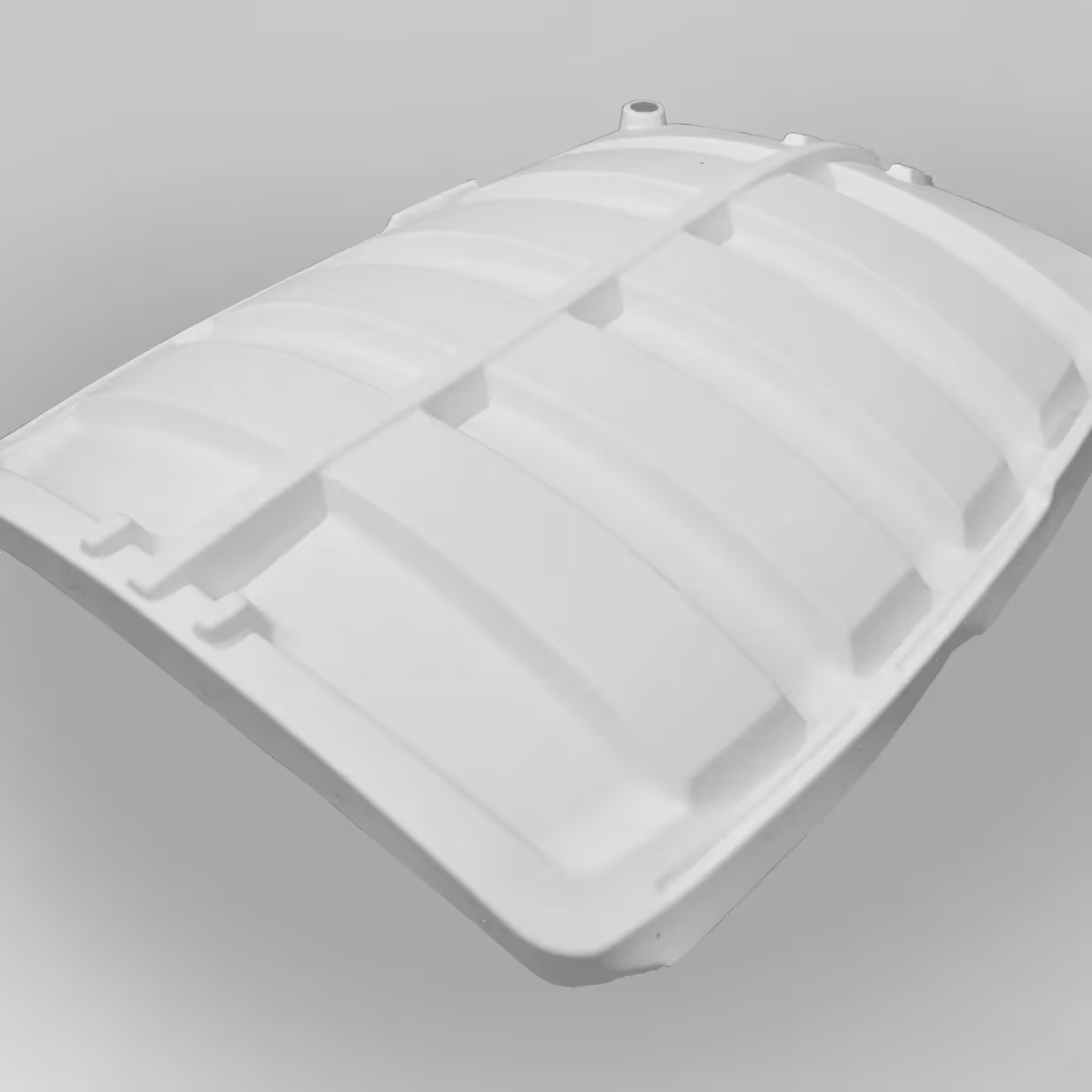 White molded plastic roof panel with raised sections and support ribs.