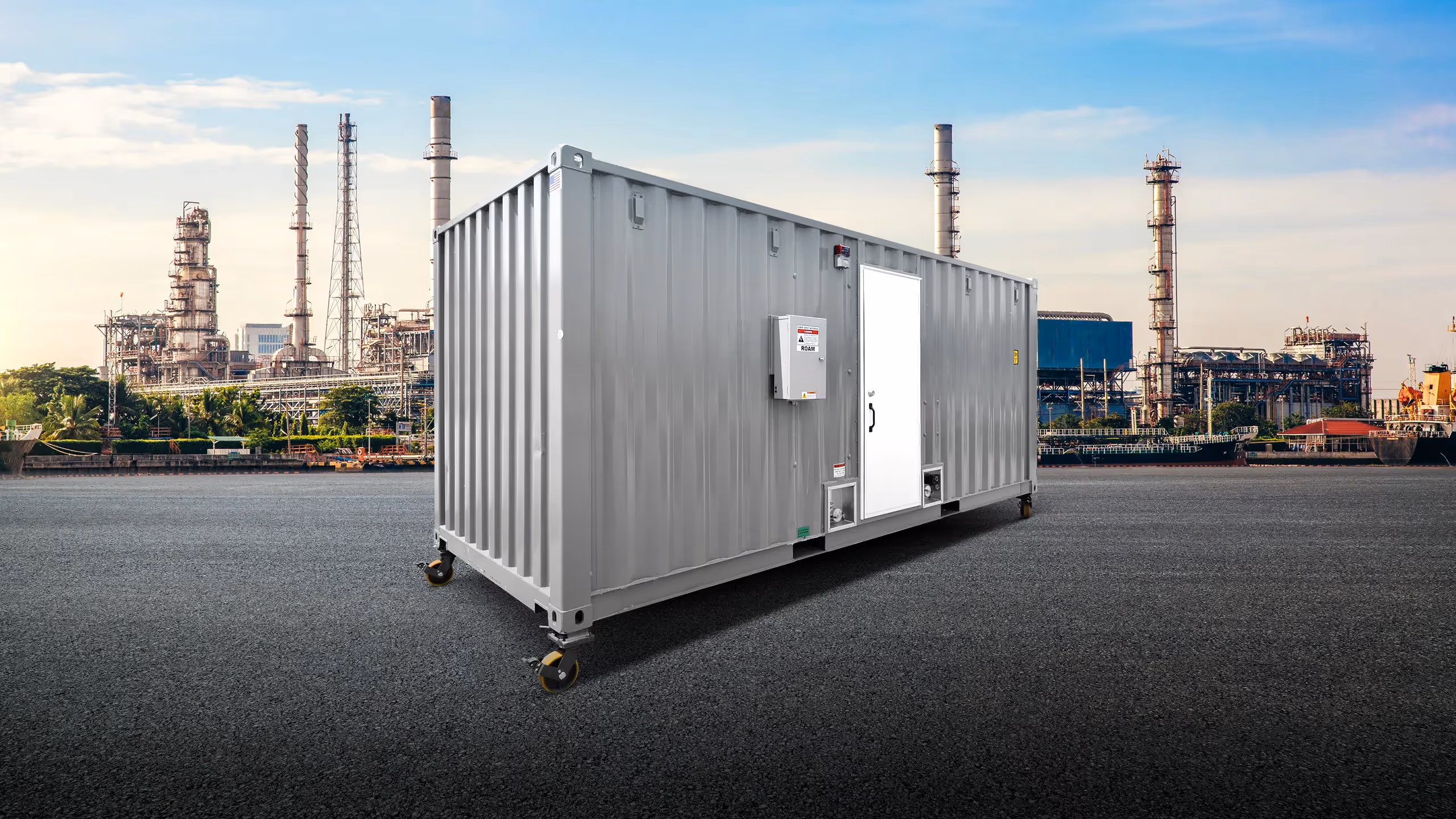 Container Pump House set against an industrial backdrop with smokestacks and urban scenery.
