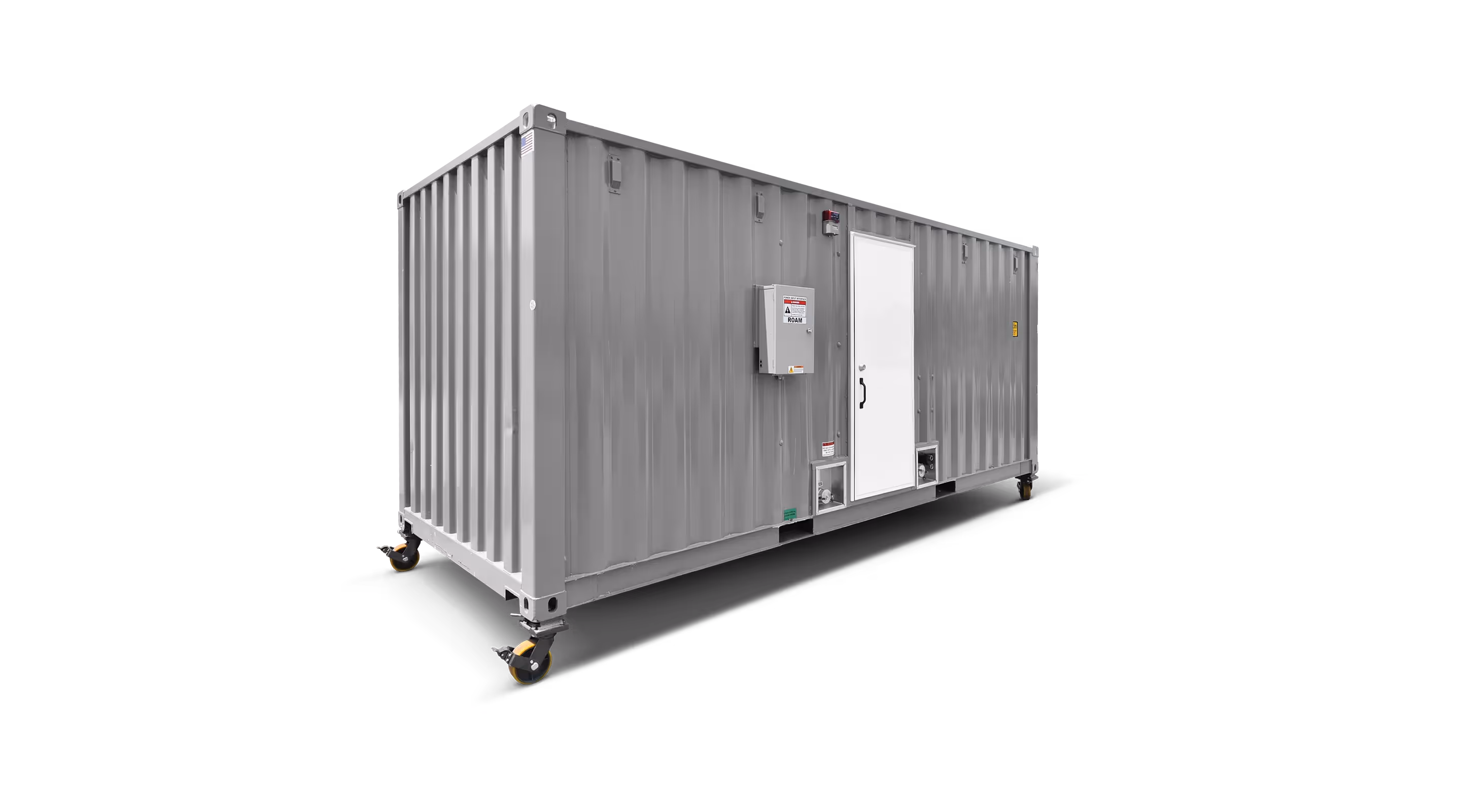 Gray container pump house on wheels with a side door and electrical panel attached.