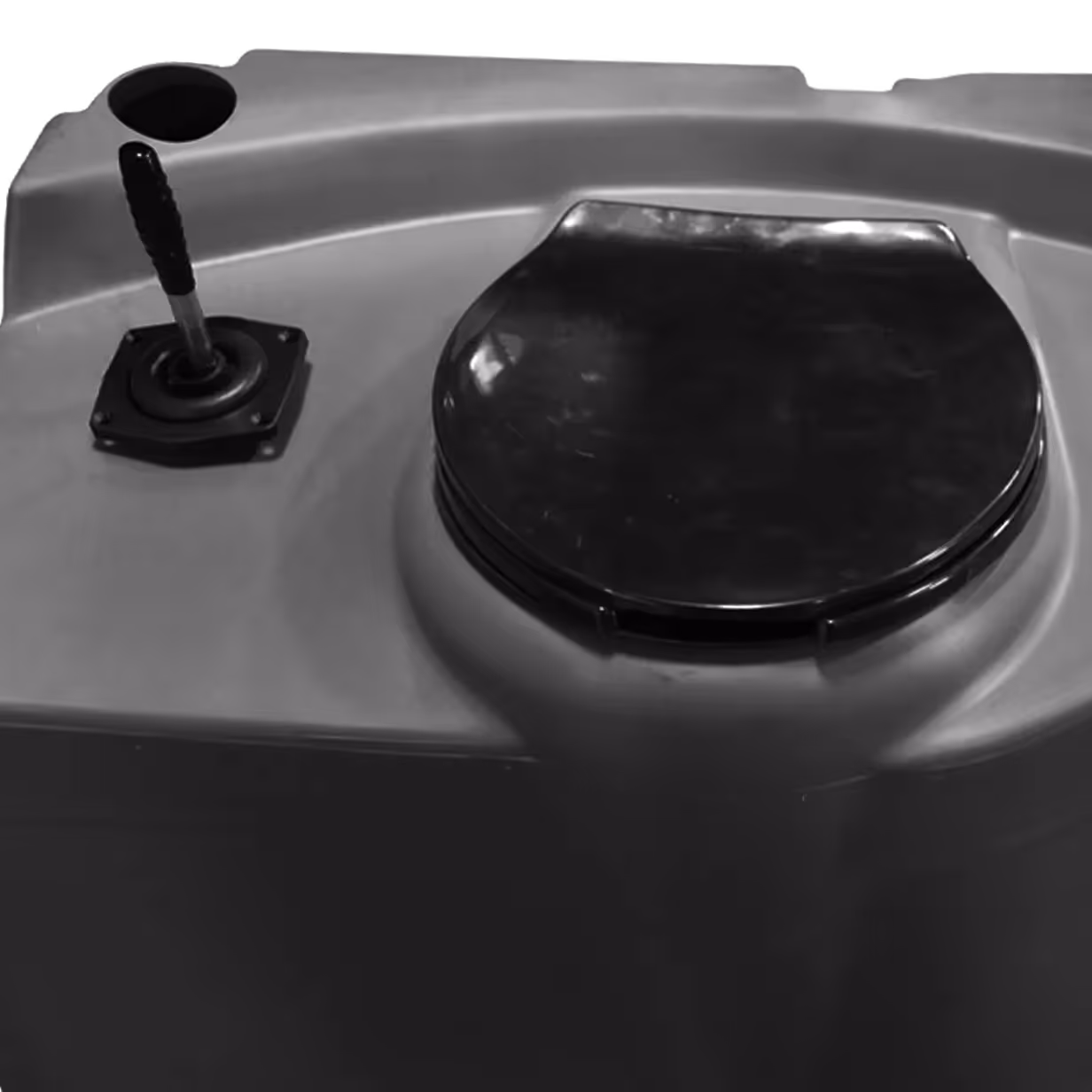Black circular hatch and a lever handle on a gray surface, likely part of a boat or vehicle.