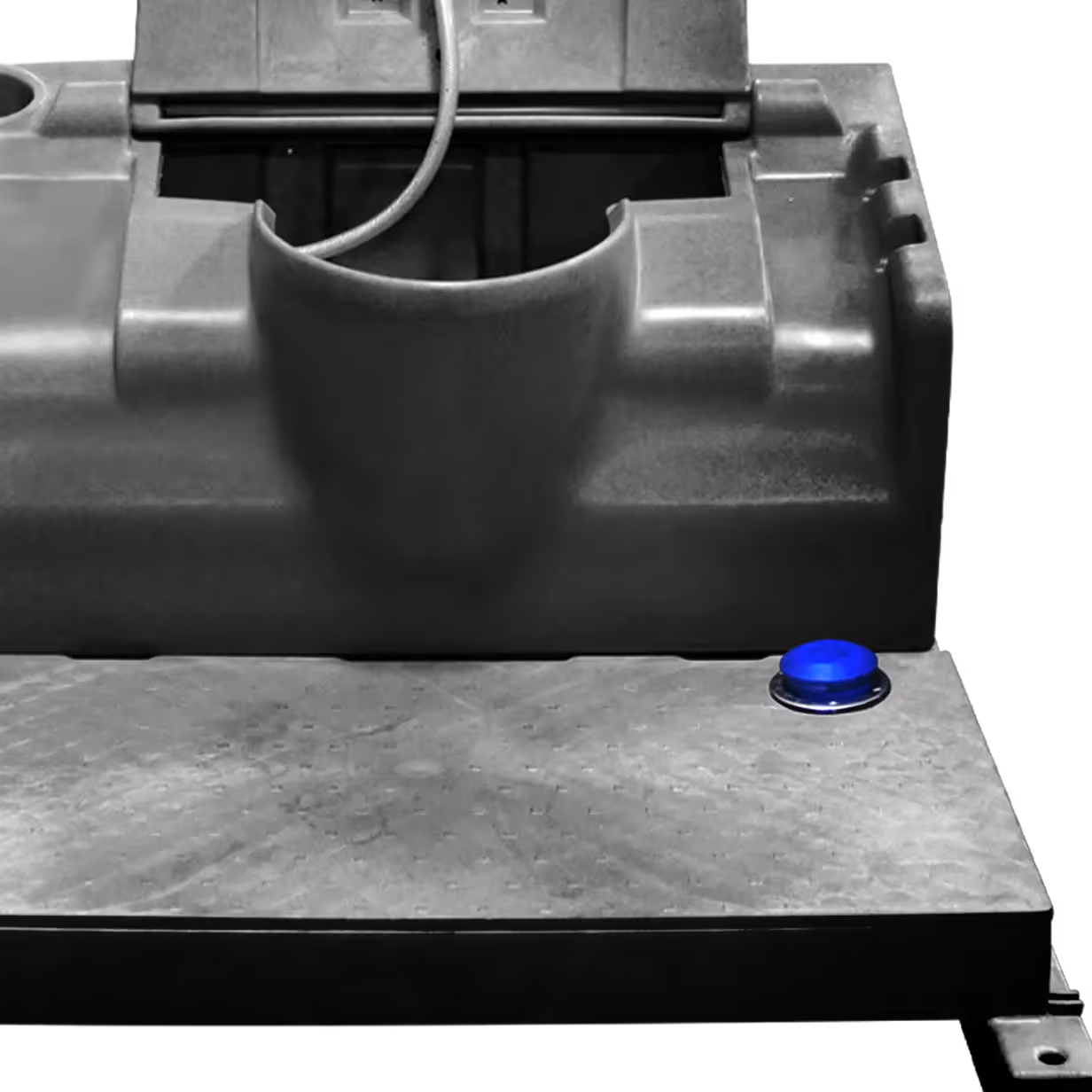 Gray industrial machine base with a textured platform and a single blue button on the right side.