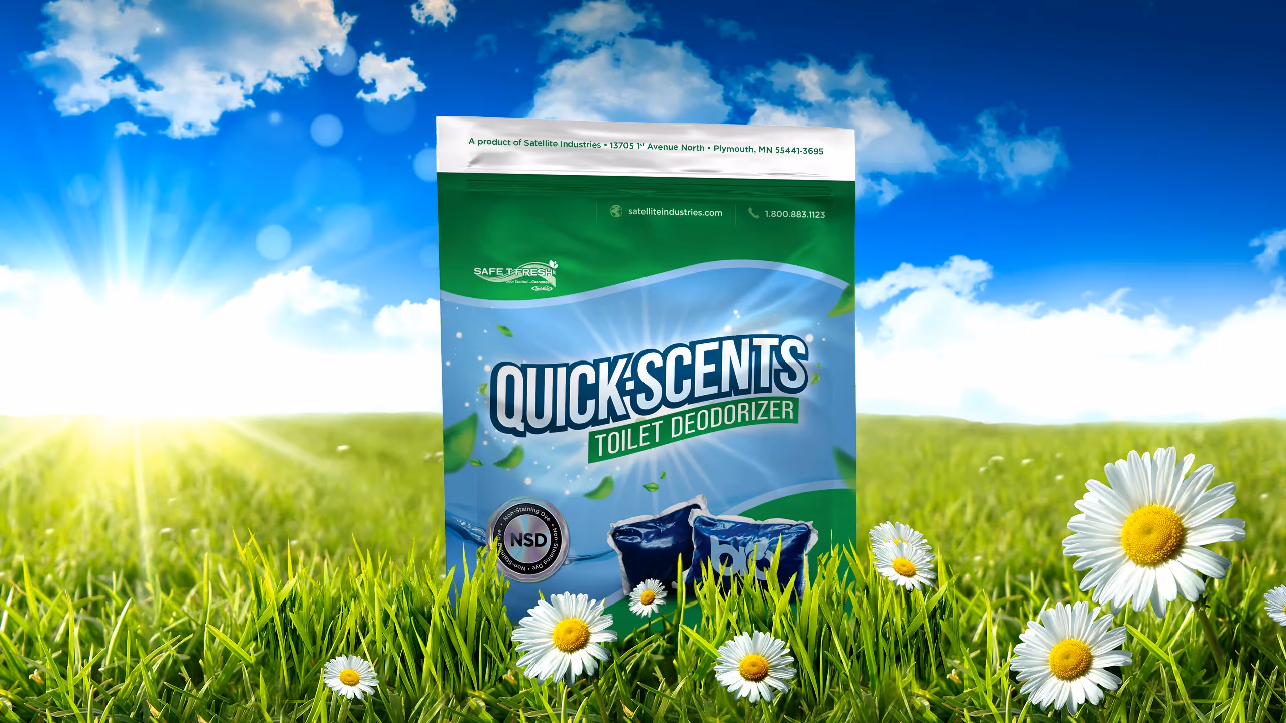 Quick Scents toilet deodorizer packaging with daisies and bright sun over green grass field.