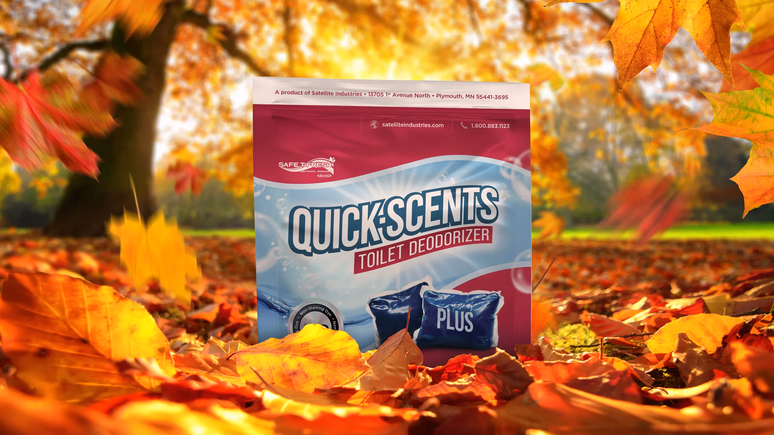 QuickScents Plus toilet deodorizer package against a backdrop of autumn leaves.