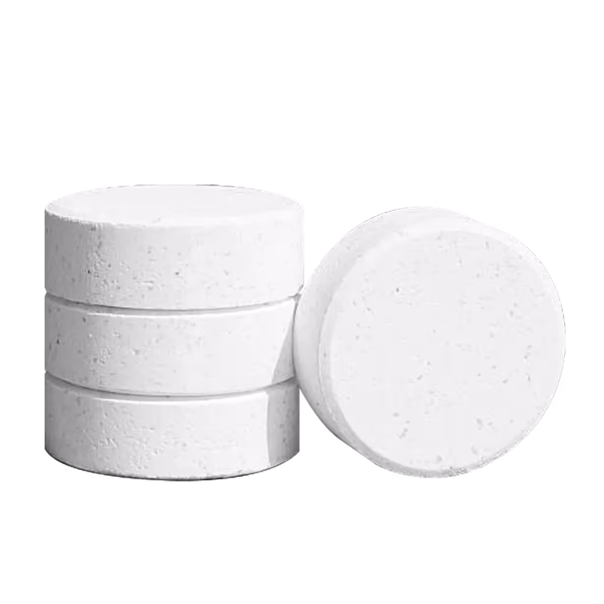 Four round white chlorine tablets stacked, with one tilted to show the surface texture.