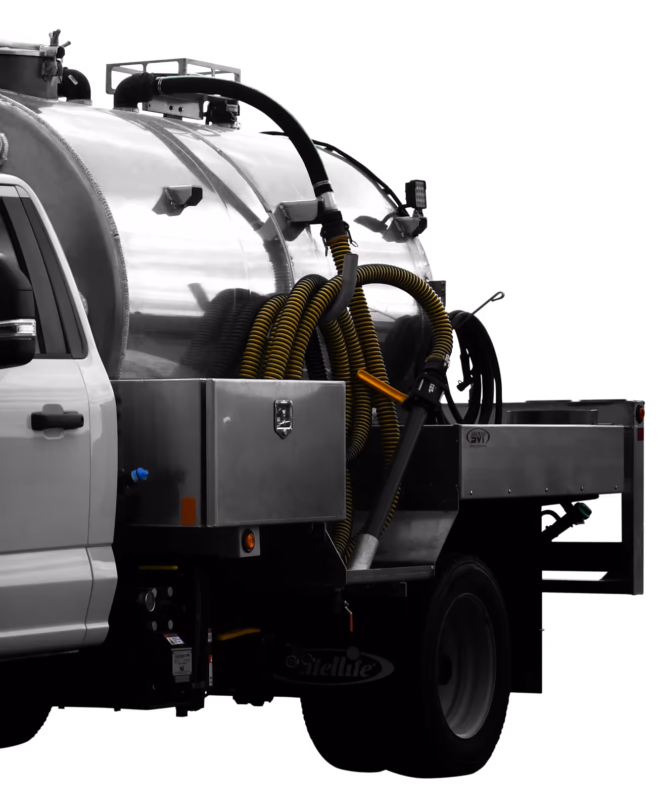 Silver vacuum truck with hoses and a tank, mounted on a white pickup chassis.