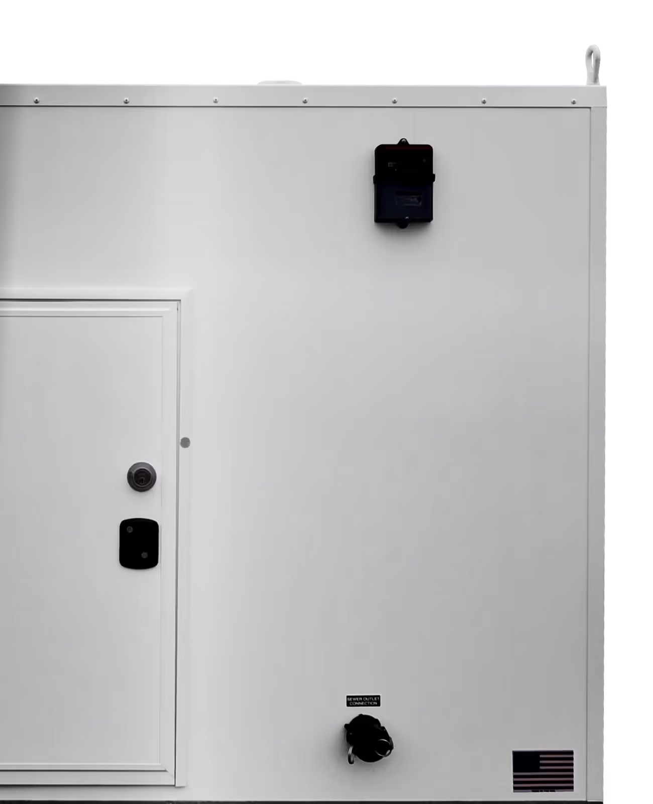 White exterior wall of a pump house featuring a door, a security light, and an outlet.