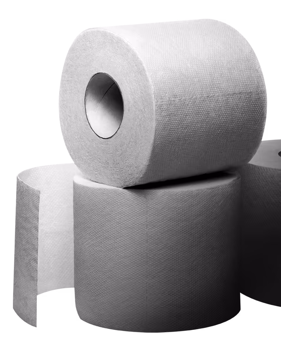 Three white rolls of textured toilet paper stacked, one with a loose sheet partially unrolled.