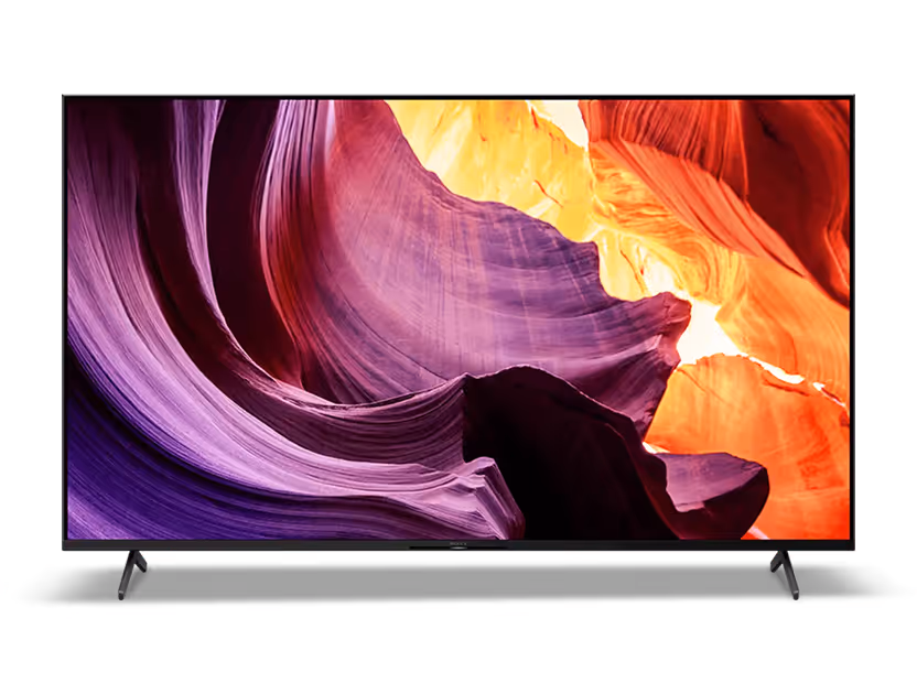 Flat screen television displaying vibrant, abstract swirling purple and orange patterns.