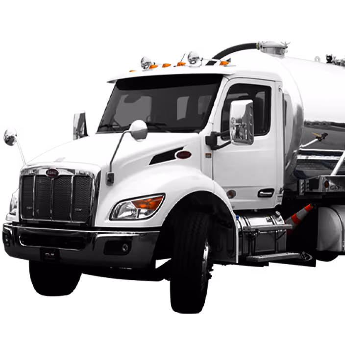 White tanker truck with chrome details and large side mirrors, viewed from front left angle.