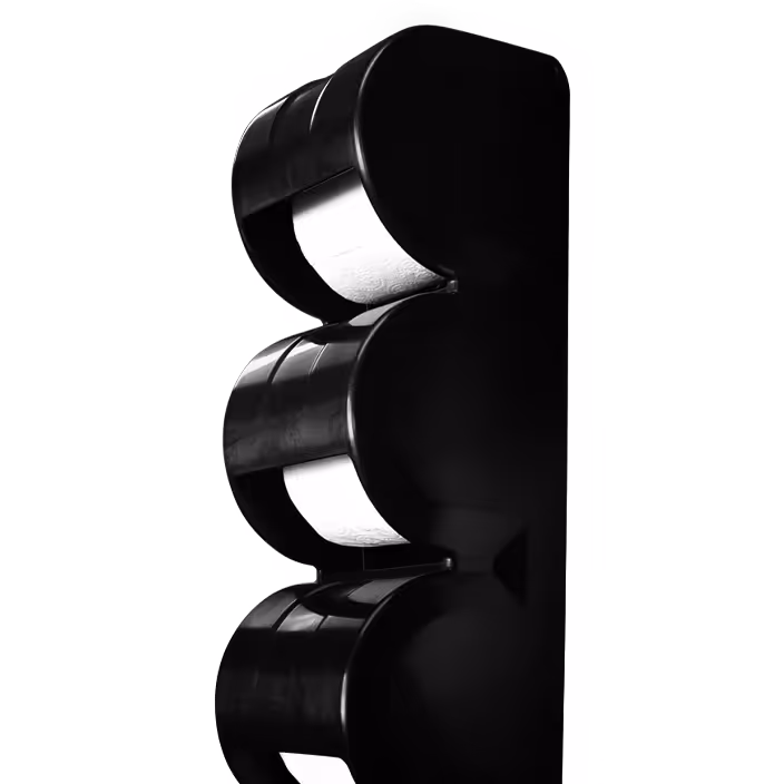 Black plastic holder mounted vertically with three white toilet paper rolls inside.