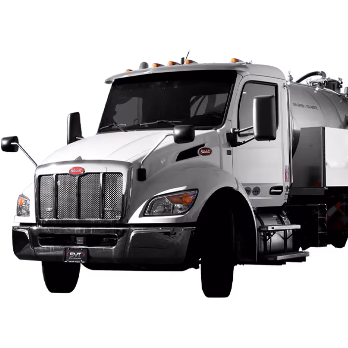 White Peterbilt vacuum truck with chrome grille and side mirrors on white background.