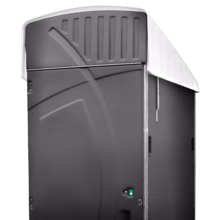 Tall gray industrial machine with a curved white cover and a green switch on the front panel.