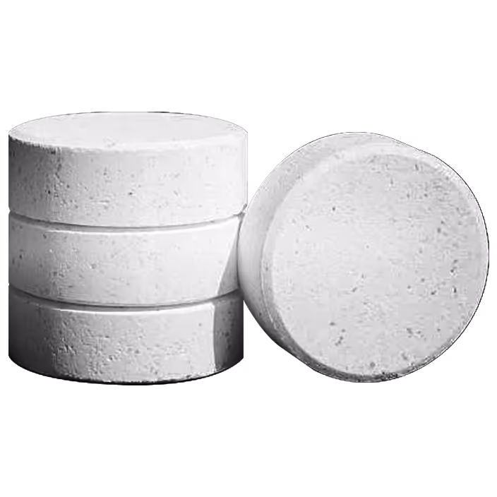 Three stacked white chlorine tablets next to a single chlorine tablet on its side.