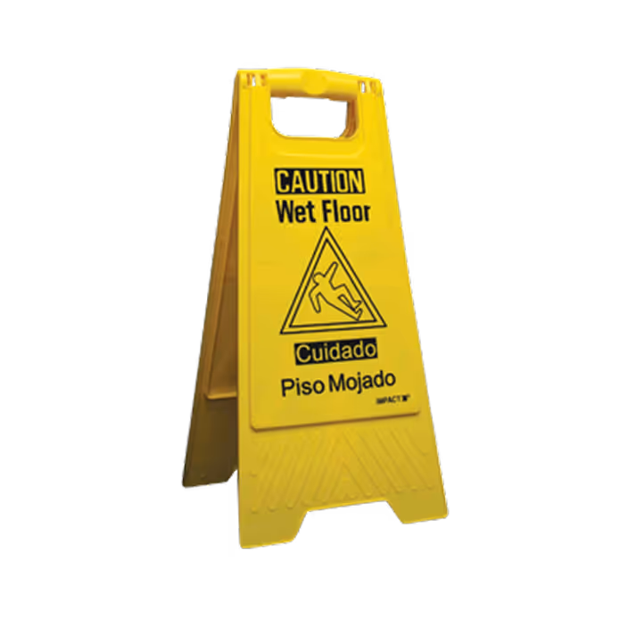 Yellow caution sign warning of wet floor with text in English and Spanish.