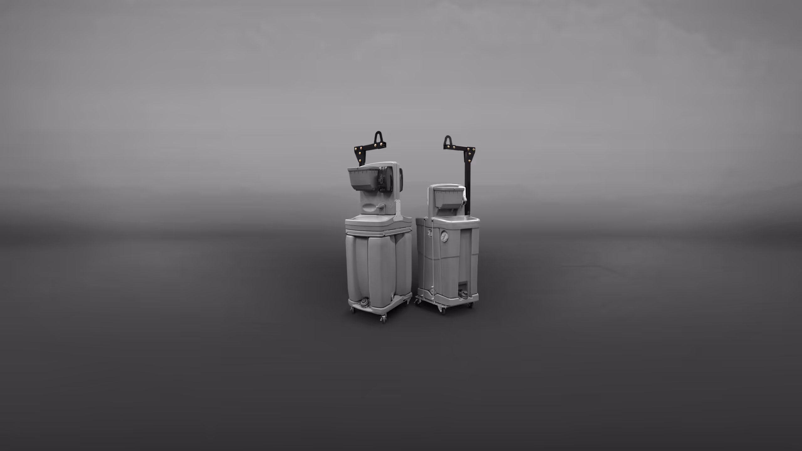 Two robotic machines with arms, one larger with a head unit, standing on a flat surface.