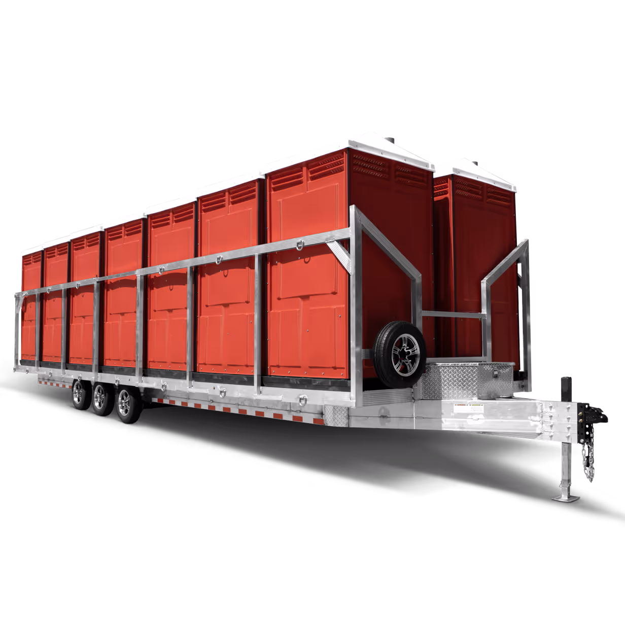 A trailer carrying several red portable restrooms arranged in a line.