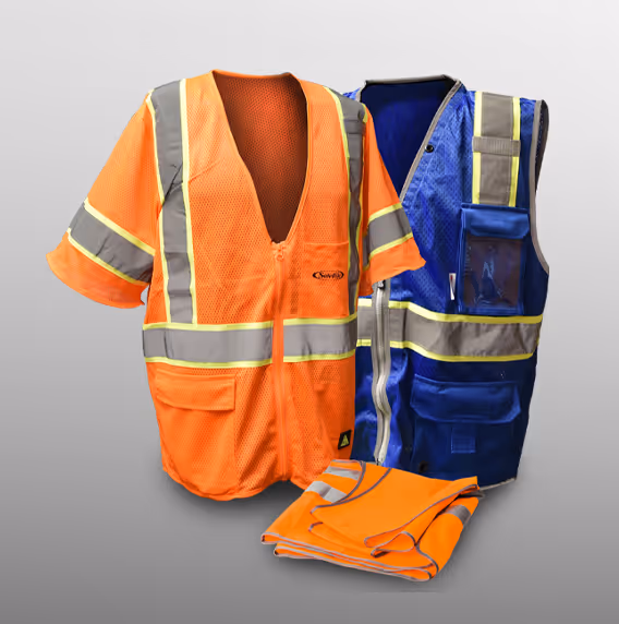 Two safety vests: one orange mesh short-sleeved and one blue with reflective strips, folded orange