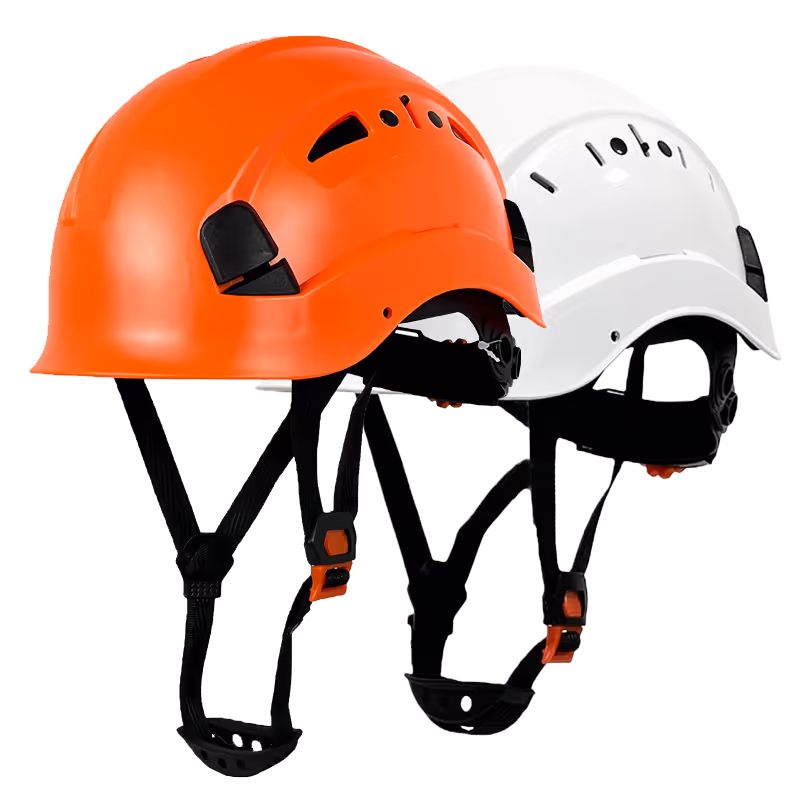Three safety helmets in orange, white, and black, arranged side by side on a black background.