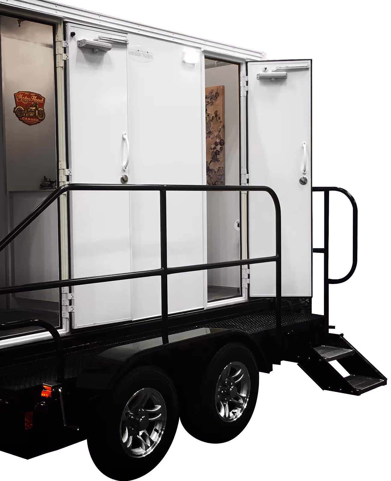 White two-station restroom trailer with accessible steps and double doors on the front.