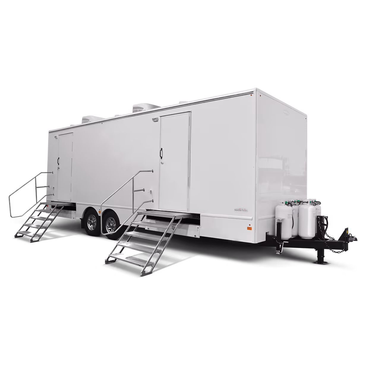 8x25' white laundry trailer with 8 stations, two sets of stairs, and storage tanks on one side.