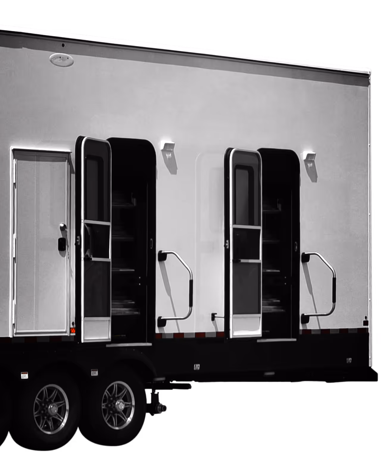 Exterior of a trailer with two open doors and metal steps leading inside on dual wheels.