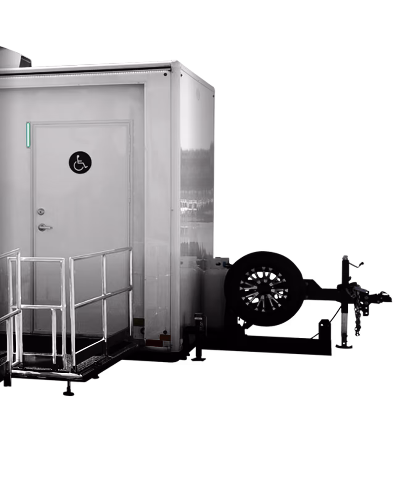 A portable restroom trailer with accessibility features and a wheelchair symbol on the door.