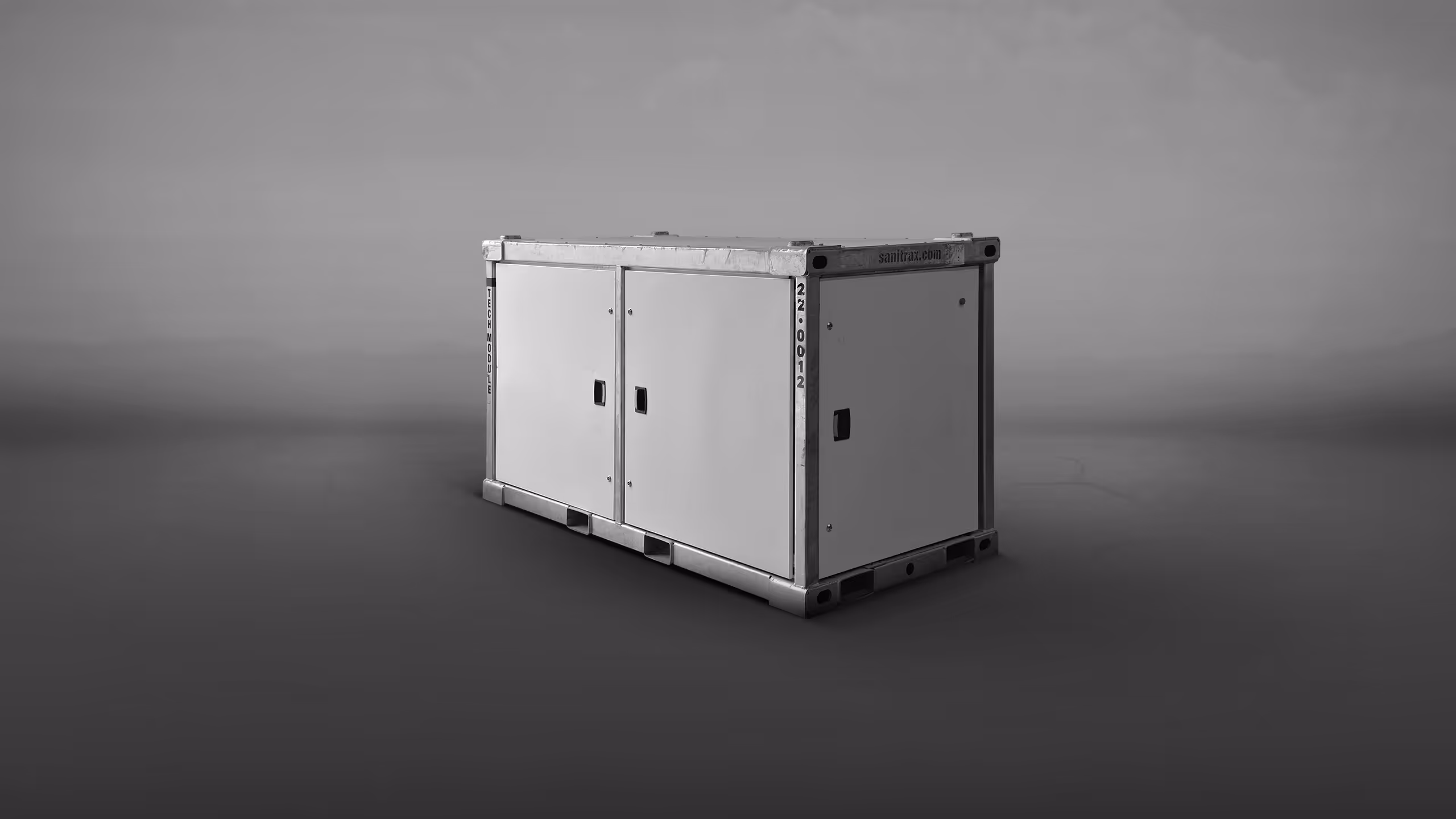 A large, rectangular white shipping container with double doors on the front.