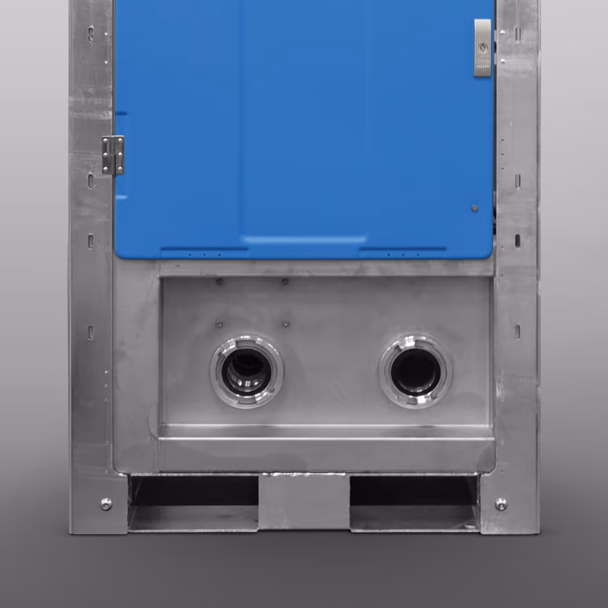 Close-up of industrial equipment with blue panel, metal frame, and two circular pipe connectors.