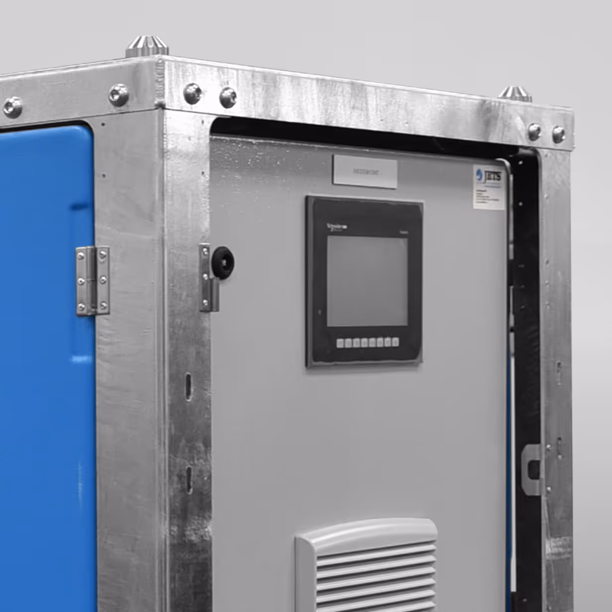 Industrial control panel box with metal frame, blue side, and black touchscreen display.