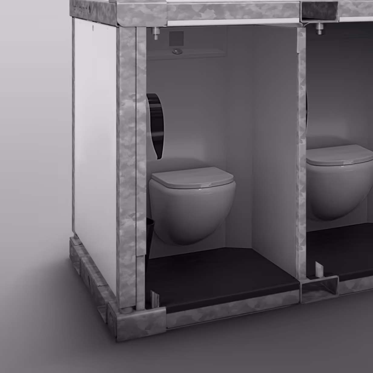 Two modular restroom stalls with wall-mounted toilets and black floors in a metallic frame.
