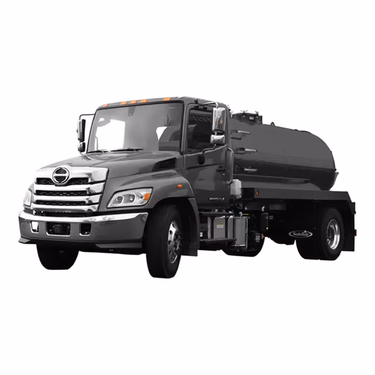 Gray Hino fuel tanker truck with a cylindrical tank on the back, isolated on white background.