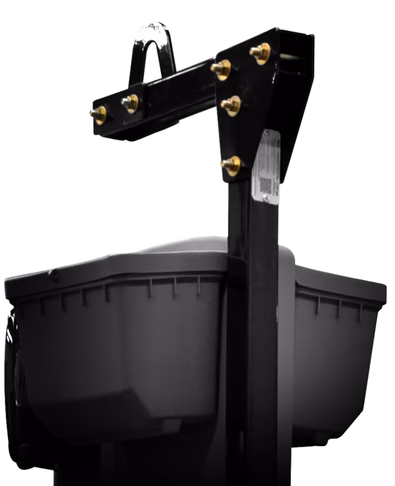Close-up of a black plastic container mounted on a metal frame with gold bolts.