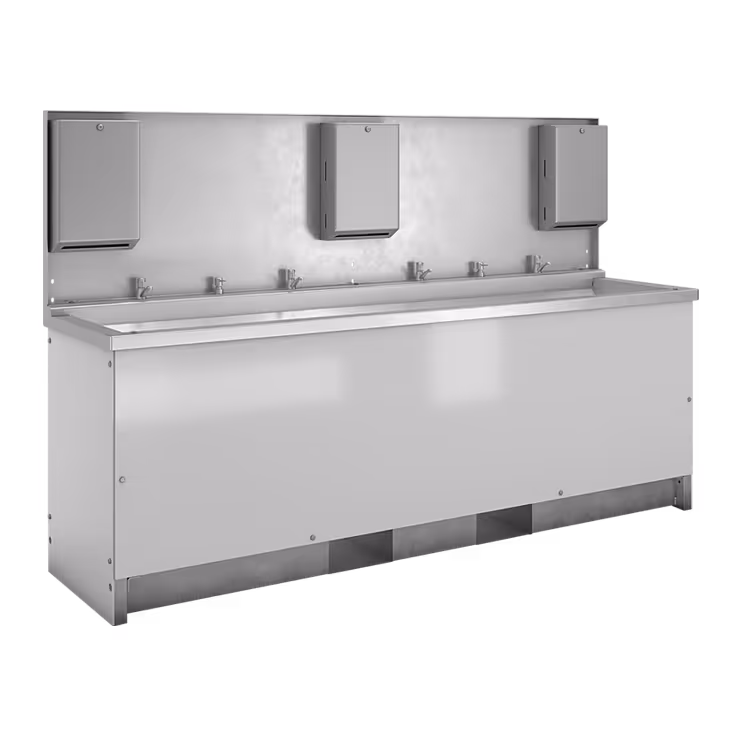 Large stainless steel handwashing station with six faucets and three wall-mounted soap dispensers.