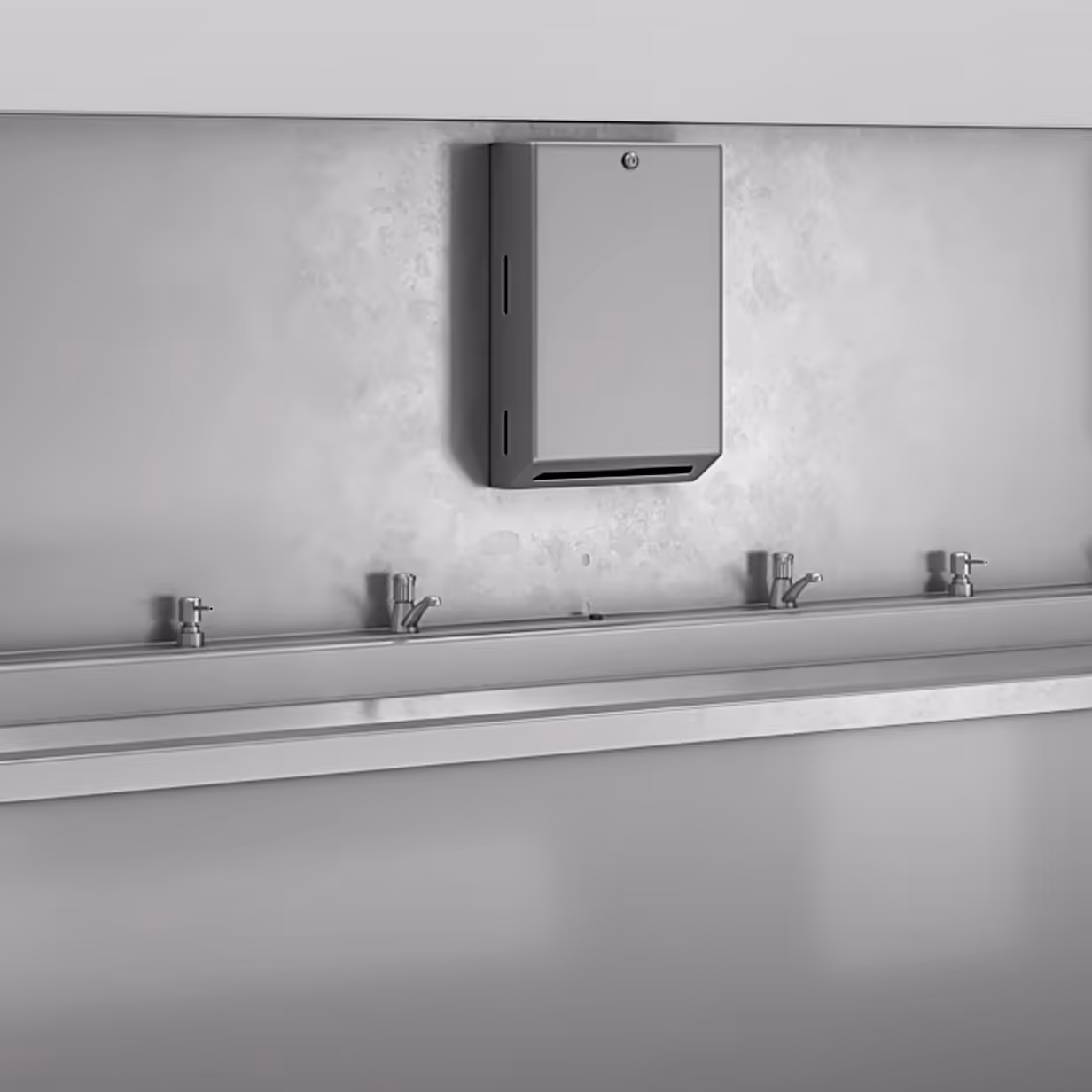 Wall-mounted paper towel dispenser above a row of four metal sinks with faucets.
