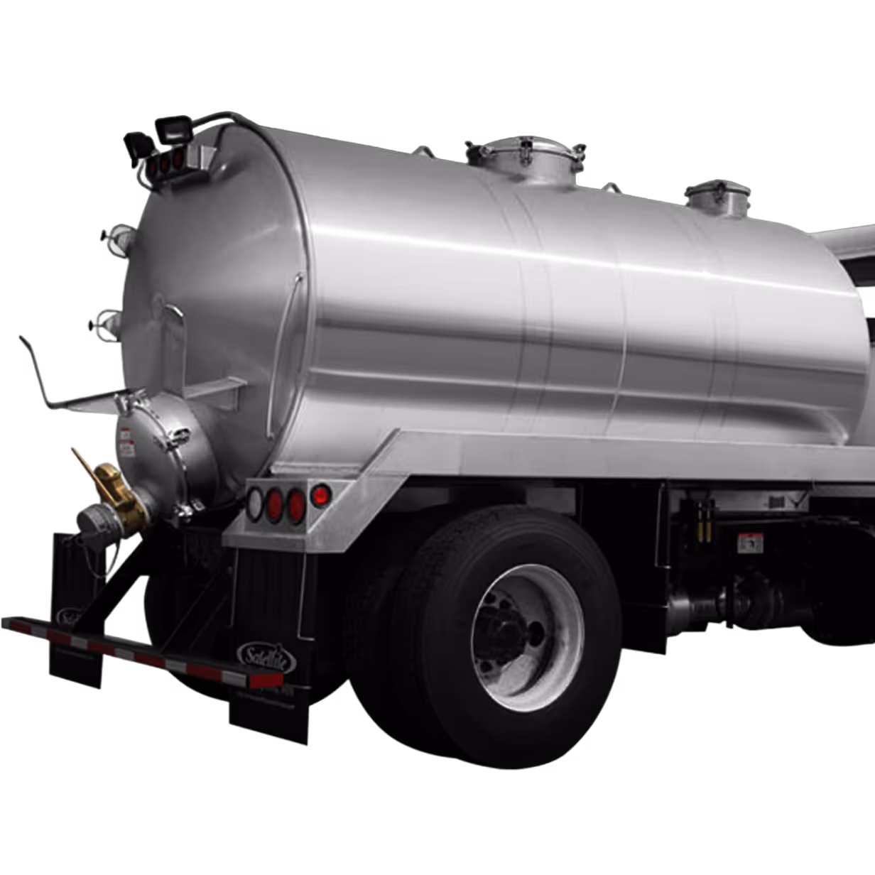 Silver cylindrical tanker truck with rear pipes and a large single rear wheel visible.