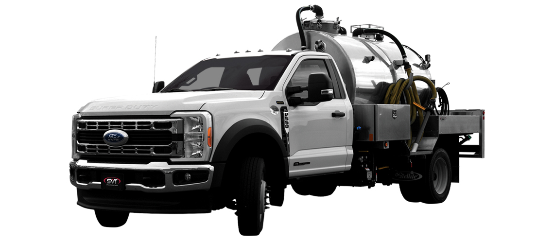 White Ford Super Duty truck with a large stainless steel tank and equipment on a flatbed.