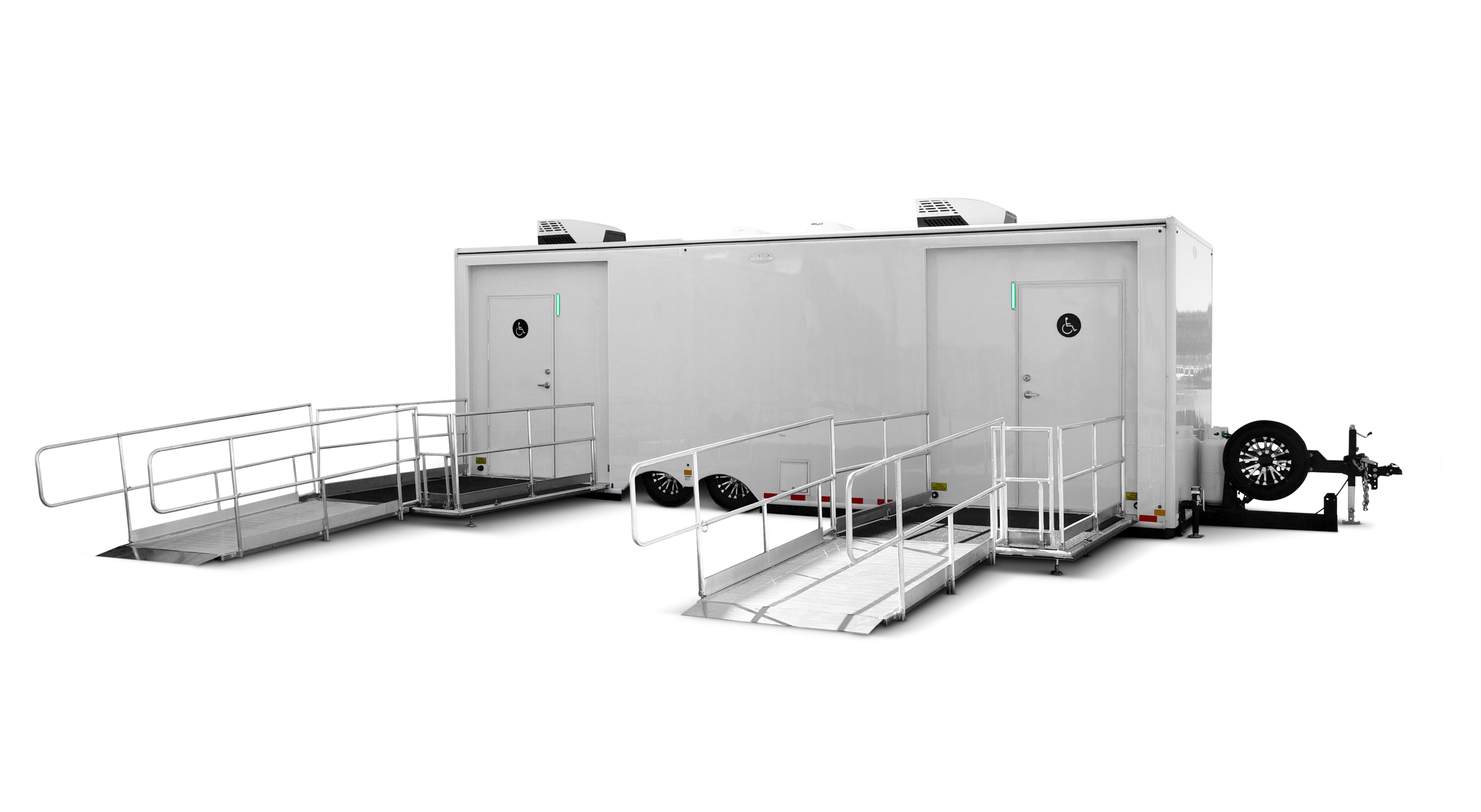 ADA-compliant laundry trailer with two entrances and ramps, featuring six washing stations.