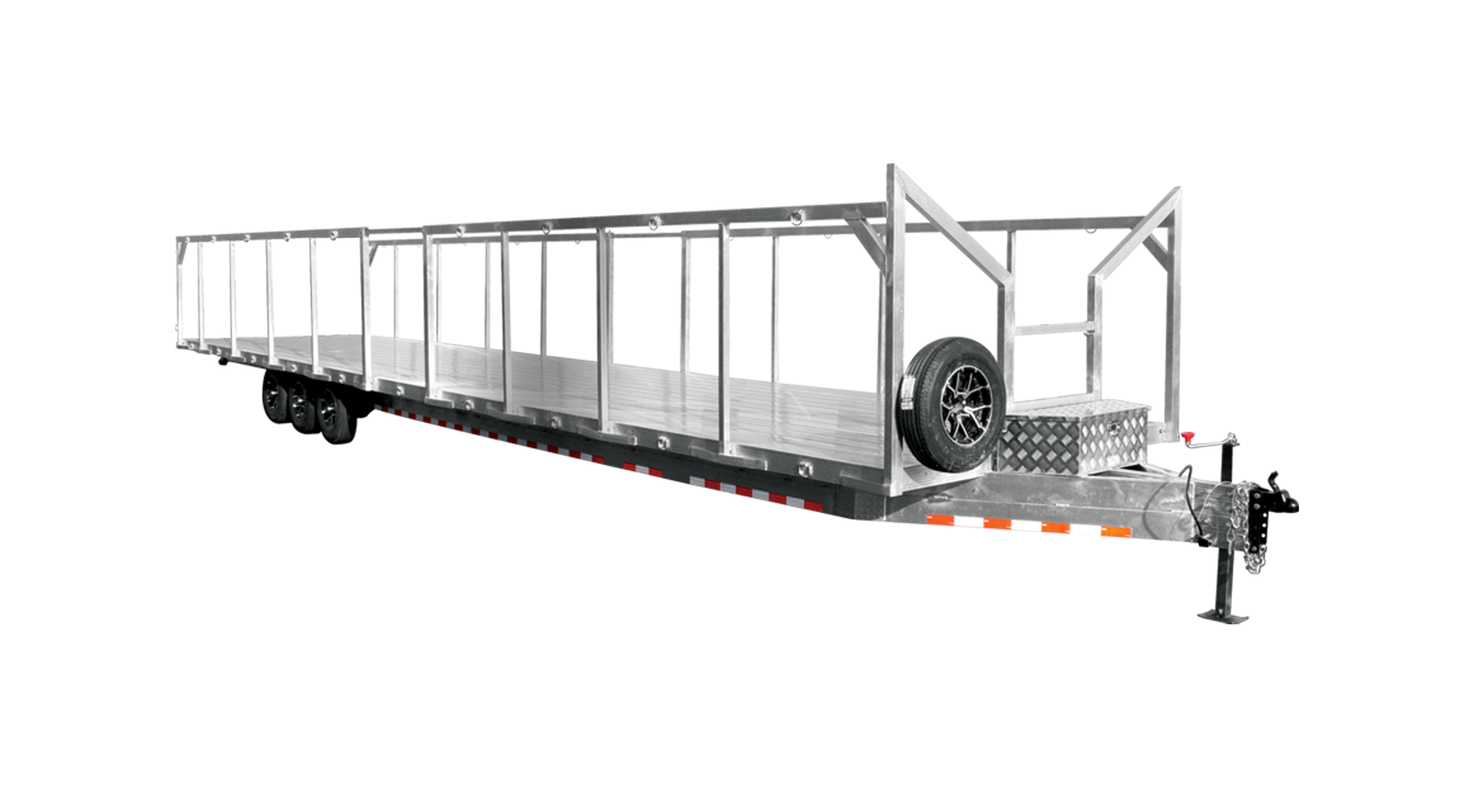 Long flatbed aluminum trailer frame with side rails, triple axles, and spare tire on front platform.